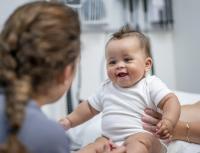 Happy baby at doctor's office